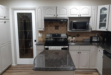  - $300 off cabinet refinishing